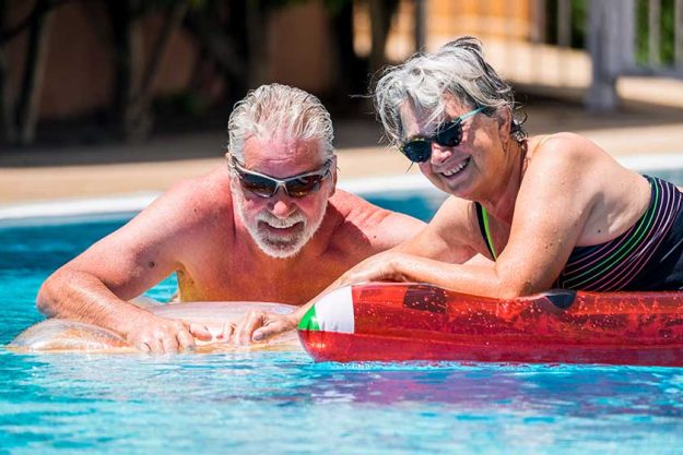 Happy retired senior caucasian couple enjoy together the summer Happy retired senior caucasian couple enjoy together the summer