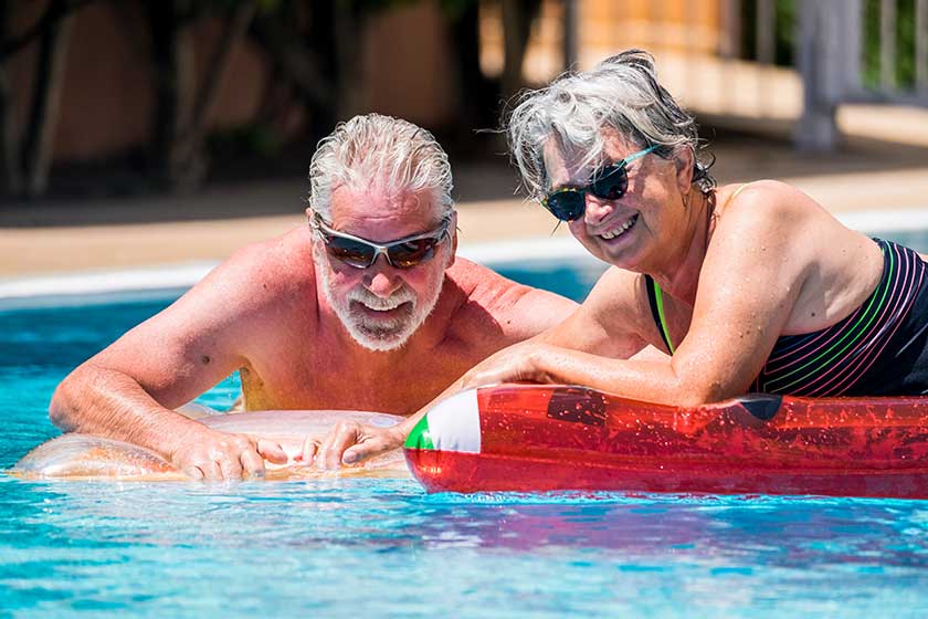Happy retired senior caucasian couple enjoy together the summer