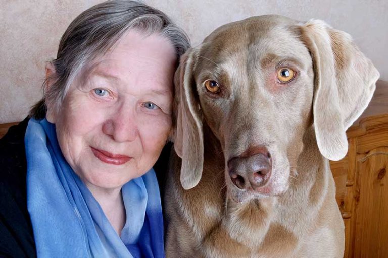 Senior woman and dog