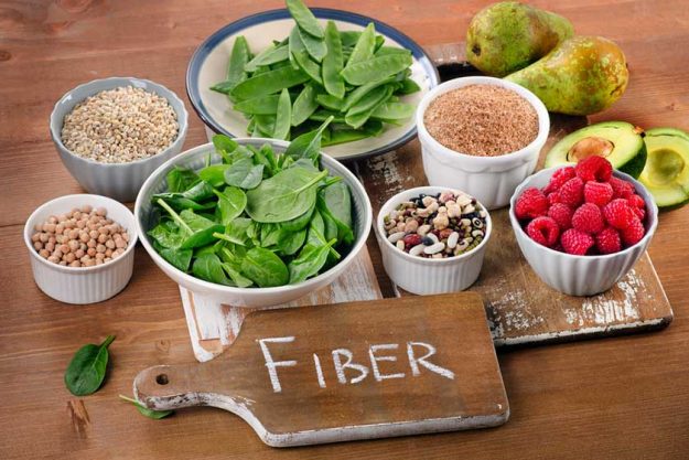 Foods rich in Fiber on a wooden table. Foods rich in Fiber on a wooden table.