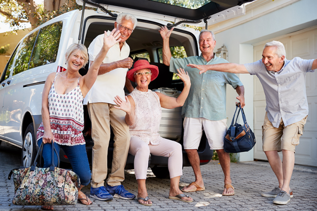 portrait-excited-senior-friends-loading-luggage-trunk-car portrait-excited-senior-friends-loading-luggage-trunk-car