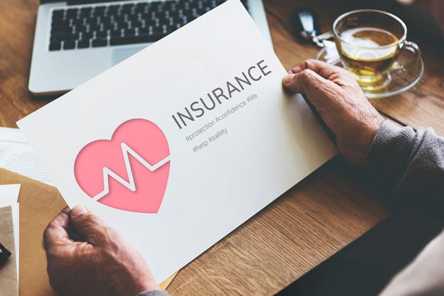 Senior man holding paper Senior man holding paper