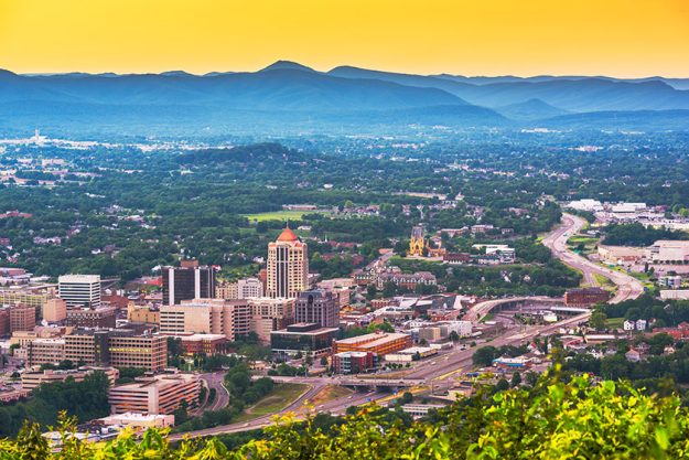 Roanoke, Virginia, USA downtown skyline from above at dusk.