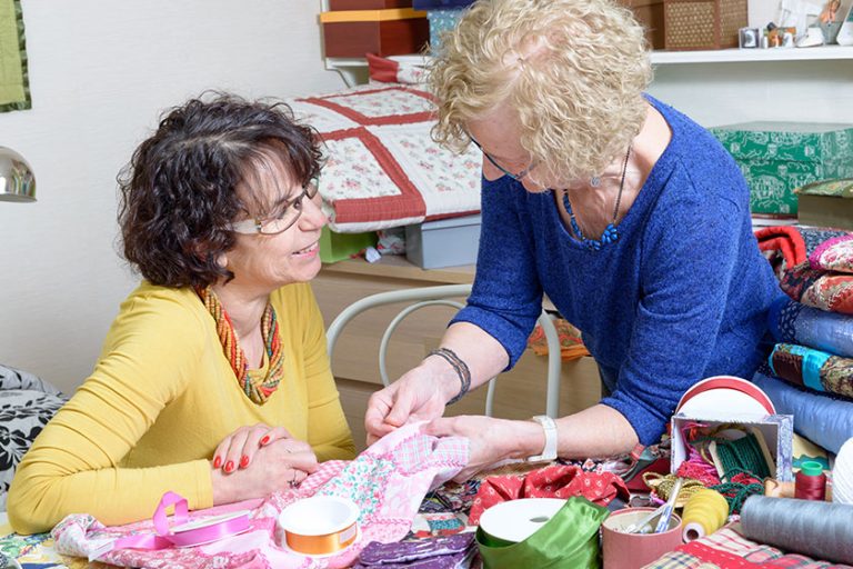 Two women working on their patchwork