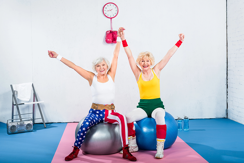 happy-senior-sportswomen-sitting-fitness-balls happy-senior-sportswomen-sitting-fitness-balls