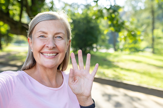 close-portrait-smiling-senior-gray-haired-woman