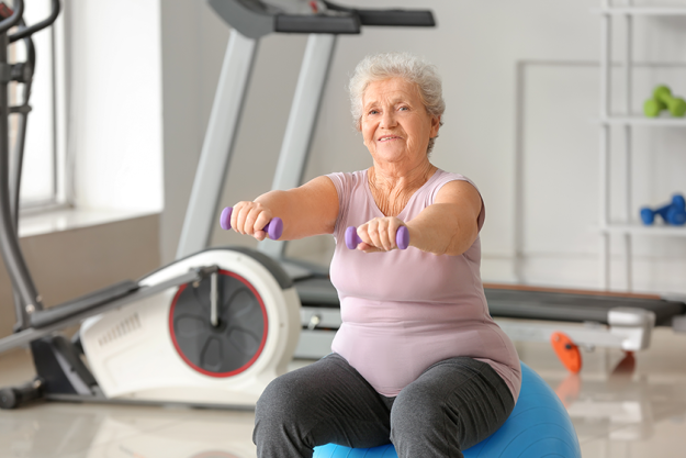 elderly-woman-exercising-gym elderly-woman-exercising-gym