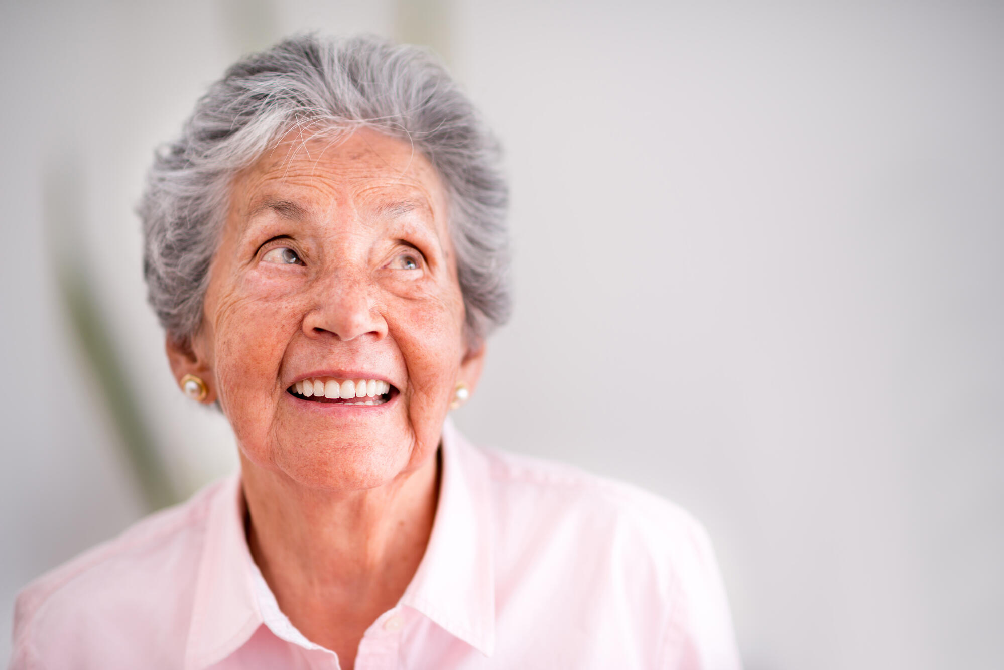 Portrait,Of,A,Pensive,Senior,Woman,Smiling
